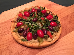 Plant-based, vegan pizza with oven roasted veggies